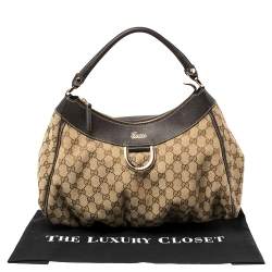 مملوكة مسبقًا حقيبة غوتشي حلقة D جلد وكانفاس GG بنية