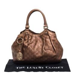 Pre Owned حقيبة يد غوتشى سوكى متوسطة جلد غوتشيسيما ذهبية ميتالك 