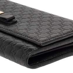 Pre Owned Gucci Black Microguccissima Leather Bow Flap Continental Wallet