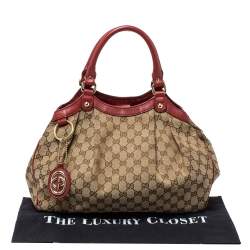 Pre Owned Gucci Maroon/Beige GG Canvas and Leather Medium Sukey Tote 