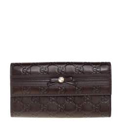 مملوكة مسبقًا محفظة غوتشي كونتينينتال مايفاير مزينة فيونكة جلد غوتشيسيما بني داكن