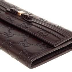 مملوكة مسبقًا محفظة غوتشي كونتينينتال مايفاير مزينة فيونكة جلد غوتشيسيما بني داكن