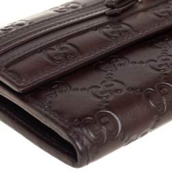 مملوكة مسبقًا محفظة غوتشي كونتينينتال مايفاير مزينة فيونكة جلد غوتشيسيما بني داكن