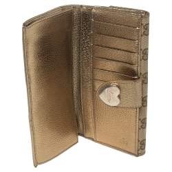 مملوكة مسبقًا Gucci Beige/Metallic GG Canvas and Leather Continental Wallet