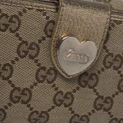 مملوكة مسبقًا Gucci Beige/Metallic GG Canvas and Leather Continental Wallet