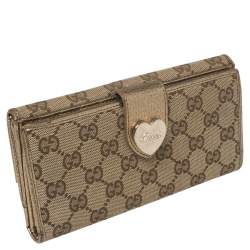 مملوكة مسبقًا Gucci Beige/Metallic GG Canvas and Leather Continental Wallet