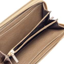Pre Owned Gucci Metallic Beige Leather Soho Zip Around Organizer Wallet