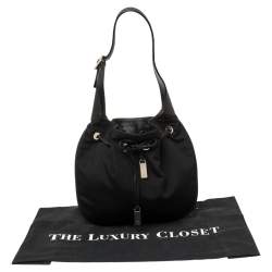 مملوكة مسبقًا Gucci Black Canvas and Leather Drawstring Hobo