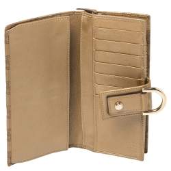 Pre Owned Gucci Metallic Beige Guccissima Leather Abbey D Ring Continental Wallet