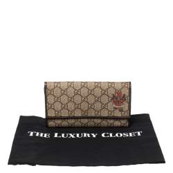 مملوكة مسبقًا محفظة غوتشي هارت تاتو GG سوبريم بني/بيج بحواف جلد لامع بقلاب