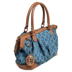 مملوكة مسبقًا حقيبة يد توتس غوتشي سوكي متوسطة جلد ودينم GG زرقاء