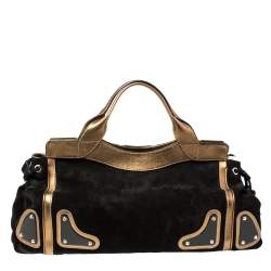 مملوكة مسبقًا حقيبة غوتشي ريس سويدي وجلد أسود/ ذهبي بيد علوية 