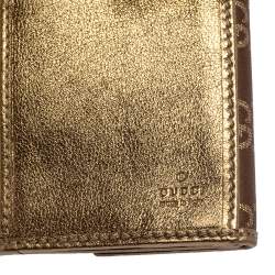 Pre Owned محفظة غوتشي مايفاير كونتيننتال جلد و كانفاسGG بيج / ذهبي بفيونكة 