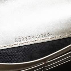 مملوكة مسبقًا محفظة غوتشي كونتينينتال جلد مايكروغوتشيسيما ذهبي بفيونكة وقلاب