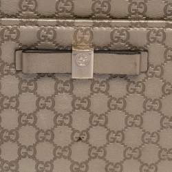 مملوكة مسبقًا محفظة غوتشي كونتينينتال جلد مايكروغوتشيسيما ذهبي بفيونكة وقلاب