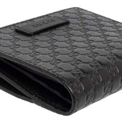 مملوكة مسبقًا محفظة غوتشي جلد ميكروغوتشيسيما أسود ثنائية الطي 