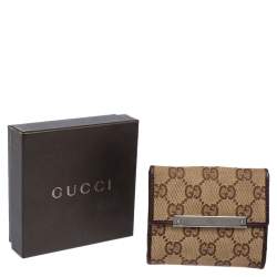 مملوكة مسبقًا محفظة غوتشي قلاب فرنش جلد وكانفاس جي جي عاجي/ بيج