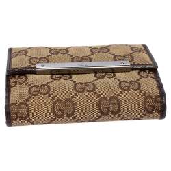 مملوكة مسبقًا محفظة غوتشي قلاب فرنش جلد وكانفاس جي جي عاجي/ بيج