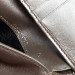 Pre Owned Gucci Metallic Silver GG Imprime Canvas Trifold Wallet