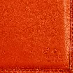 مملوكة مسبقًا محفظة كونتيننتال غوتشي جلد مايكروغوتشيسيما برتقالي ثلاثية الطي