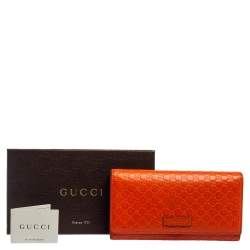 مملوكة مسبقًا محفظة كونتيننتال غوتشي جلد مايكروغوتشيسيما برتقالي ثلاثية الطي