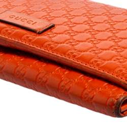 مملوكة مسبقًا محفظة كونتيننتال غوتشي جلد مايكروغوتشيسيما برتقالي ثلاثية الطي