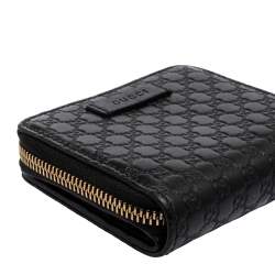 Pre Owned Gucci Black Microguccissima Leather Compact Wallet