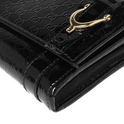 مملوكة مسبقًا محفظة كونتينينتال غوتشي نيس جلد لامع ميكروغوتشيسيما أسود