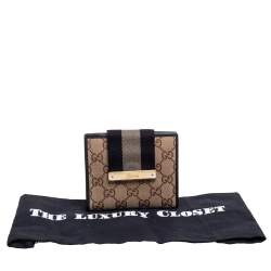 Pre Owned Gucci Beige/Black GG Canvas and Leather Web Flap French Wallet