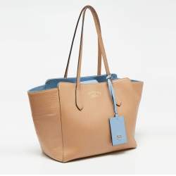 مملوكة مسبقًا حقيبة يد توتس غوتشي سوينج جلد بيج