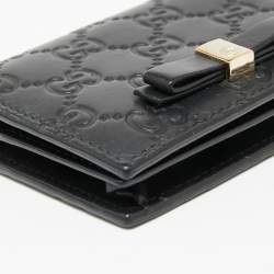 Pre Owned حافظة بطاقات غوتشي جلد غوتشيسيما سوداء  قلاب فيونكة 