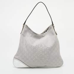 Pre Owned Gucci Metallic Silver GG Canvas and Leather Medium Britt Hobo 
