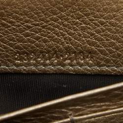 مملوكة مسبقًا محفظة كونتيننتال غوتشي سوهو جلد بيج ميتالك بقلاب 