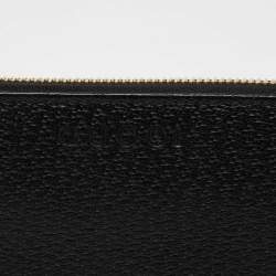 مملوكة مسبقًا محفظة غوتشي جلد سوداء بسحاب محيط