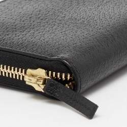مملوكة مسبقًا محفظة غوتشي جلد سوداء بسحاب محيط