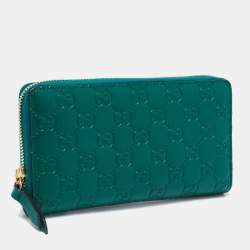 مملوكة مسبقًا محفظة كونتيننتال غوتشي جلد غوتشيسيما أخضر سحاب ملتف 