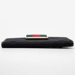 Pre Owned محفظة كونتينينتال غوتشي جلد وكانفاس جي جي أسود قلاب شريط ويب