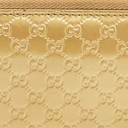 Gucci Gold Microguccissima Patent Leather Zip Around Wallet