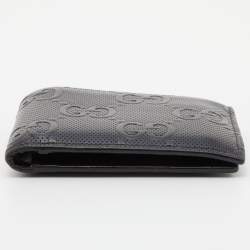 مملوكة مسبقًا Gucci Black Perforated GG Embossed Leather Bifold Wallet