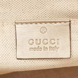 Pre Owned Gucci Gold Micro Guccissima Leather Tassel Zip Clutch