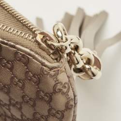 Pre Owned Gucci Gold Micro Guccissima Leather Tassel Zip Clutch
