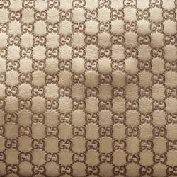 Pre Owned Gucci Gold Micro Guccissima Leather Tassel Zip Clutch