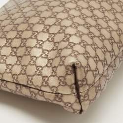 Pre Owned Gucci Gold Micro Guccissima Leather Tassel Zip Clutch