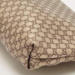 Pre Owned Gucci Gold Micro Guccissima Leather Tassel Zip Clutch