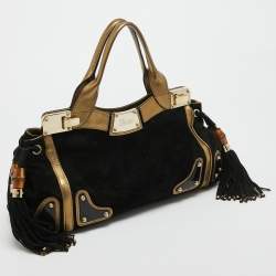 مملوكة مسبقًا Gucci Black/Gold Leather and Suede Tassel Race Bag