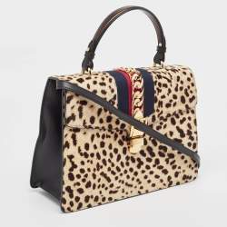 Pre Owned Gucci Beige/Black Leopard Print Calfhair and Leather Medium Sylvie Top Handle Bag