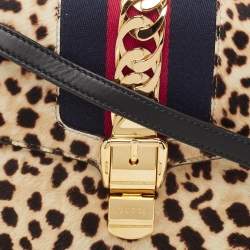 Pre Owned Gucci Beige/Black Leopard Print Calfhair and Leather Medium Sylvie Top Handle Bag
