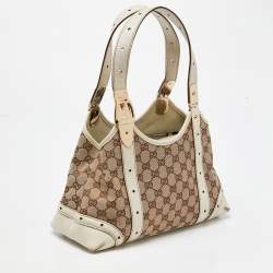 مملوكة مسبقًا Gucci Off-White/Beige Monogram Canvas and Leather Metal Buckle Shoulder Bag