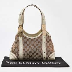 مملوكة مسبقًا Gucci Off-White/Beige Monogram Canvas and Leather Metal Buckle Shoulder Bag