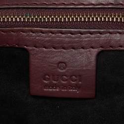 مملوكة مسبقًا Gucci Two Tone Burgundy Leather Stirrup Shoulder Bag